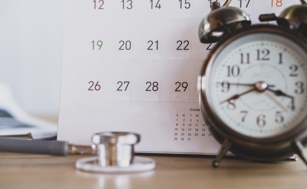 calendar with clock and stethoscope