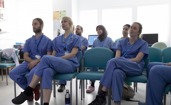 Trainees in a meeting